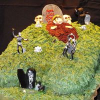 Over The Hill - 40Th Birthday Sculpted cake - all buttercream icing...some non-edible figures, rest done in fondant & Gumpaste