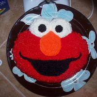 Elmo Cake This is my first attempt at an elmo cake for my daughters first birthday....i was sooo happy with it and actually got asked if i could be...