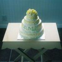 Petite Wedding Cake Per my customer's request, I created a smaller version of a wedding cake, decorating in the shower colors and adorned with the couple...