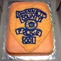 Badge.jpg Customized badge for cadet graduating from Gwinnett County PD Academy near Atlanta. I was disappointed with the color but the detail was...