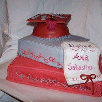 High School Graduation Cake The bottom is strawberry cake the rest are yellow cake. The bottom two are BC and the cap is fondant. Hand painted the fondant diploma....