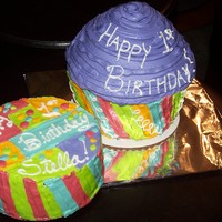 1St Birthday Giant Cupcake Cake This is a chocolate cake with BC icing. I used the silicone cupcake pan from the infomercial, but I got it at a local toy store. Made to...