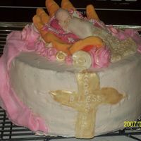 He's Got The Little Baby In His Hands This cake is for a baptisim, it is a french vinalla cake with fondant accents and strawberry filling. The cross gave me a hard time and I...