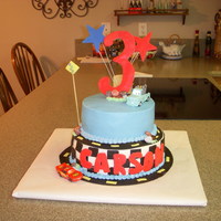 Cars Cake Birthday cake for a little boy crazy about "Cars". Top layer was white cake & bottom layer was chocolate with fondant accents...