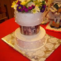 80Th Birthday Cake This was my Mom's 80th birthday cake. I made a cake divider & used photos of her through the years. It was the chocolate version...