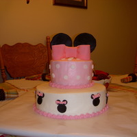 Minnie Mouse Cake Chocolate cake with homemade buttercream & fondant accents.