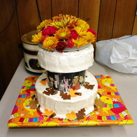 Fall Birthday Cake Carrot cake on top & chocolate on bottom, both with cream cheese icing, fondant leaves & candy corn.