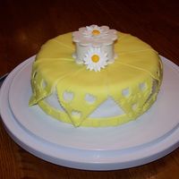 Hankerchief Fondant Cake Made in the final class of the fondant and gumpaste course. Was given to a co-worker of my mom's for her birthday and she loved it!