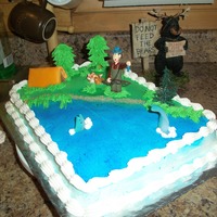 Fishing Scene Got the fisherman from Walmart. The trees are iced pretzel sticks and the tent is fondant over graham crackers.