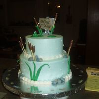 Gone Fishin' buttercream and fondant accents. thanks for looking, this really was a last minute cake. i had it frosted blue and still couldn't come...
