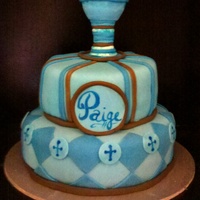 First Communion Blue Fondant covered almond amaretto cream cake with white chocolate cream cheese icing gumpaste chalice on top.
