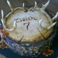 Tree Stump With Deer Antlers Tree stump buttercream frosting "bark" with handpainted fondant wood rings on top. Deer antlers are gumpaste and gumpaste leaves...