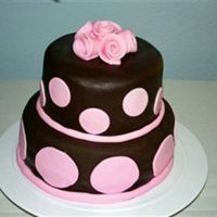 Emmerson's Cake For my neice's baby shower, this was my first stacked cake. I obviously had difficulties with the bottom tier. Live and learn!