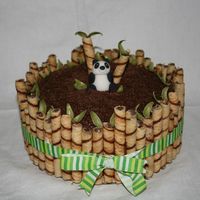 Ambria's Panda Made for my cousin. If I can say so myself...I LOVE THIS CAKE!!!! hehehe. I'm very happy with the outcome. Dark chocolate cake with...