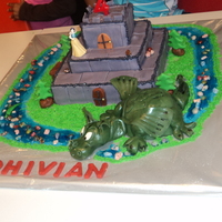 Dragon Castle Cake my 4 year old was very specific in his requirements: purple castle made of blocks, trees and bench around castle, fat green dragon,...
