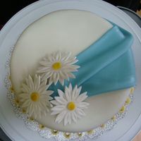 Swag And Daisies I made this cake for my grandparents anniversary, swag and base are MMF, daisies are made out of gum paste.