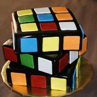 Rubik's Cube Cake 8 inch marble cakes carved down on the side to make the edges sharper. This was for my son and a LOT of fun to make!!
