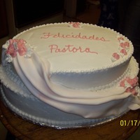 Pastor' Anniversary This was for the Pastor at my friend's church. Not sure what year anniversary. Buttercream icing with fondant drape.