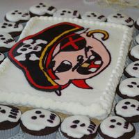 Pirare Cake W/cupcakes My son's 4th bday cake. Davids yellow cake with buttercream transfer (made with cali4dawns recipe) Ghirardelli fudge cake cupcakes...