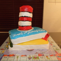 Dr Seuss Cake this is cake is two books, 9x13 three layers each of red velvet and vanilla with cream cheese icing, covered in mmf, the hat is five 4inch...