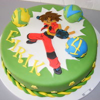 Bakugan Cake Chocolate cake with chocolate buttercream. Cakeballs on top