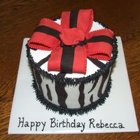 Rebecca's Birthday Cake Buttercream with gumpaste bow/fondant accents. Bow made after watching Sharon's "Boxes and Bows."