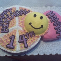 Daughter's Birthday Cake - Peace, Love & Happiness Here is my latest cake creation. My daughter wanted a cake with a peace sign and a heart. I chose to add the smiley face