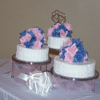 My 2Nd Wedding Cake This is simple basket weave in plain icing. The cakes are on the 3-tier party stand by Wilton. The stand and artificial flowers were...