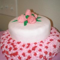 1St Fondant Cake This Valentines Day Cake, was my first attempt at a fondant covered cake. The bottom layer was so bad I had to pipe butter cream stars over...