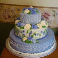 My Wedding Cake It didn't turn out quite the way I had planned and I had several problems with my crusting buttercream, but overall it came out better...