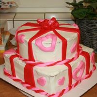 Valentines Cake My first attempt at MMF... as you can see I had issues with my edges getting iced. I finally just gave up. But I had fun with the MMF.