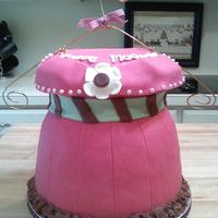 Baby Dress Cake Made to match a baby dress on the invitation... It was made for a mommy to be that has been trying for six years to have her second baby....