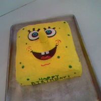 Spongebob Head This is my second cake ever done. It is double layer, fun-fetti. The accents are fondont, and the nose is rice-krispy covered with fondant...