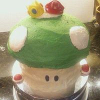 Mario Mushroom Mario mushroom grooms cakes. white cake, buttercreme icing, gumpaste accents.