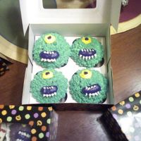 More Halloween Cupcakes! Again, these were a lot of fun to make!Someone said they looked like Mike from Monsters Inc; not was I was going for, but thanks! :)