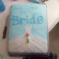 Bridal Shower This cake I made for my future Sister-in-law. It's a yellow cake with buttercream icing and fondant accents.