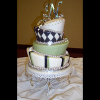 Whimsical Wedding With Bling I love this cake. The bottom 3 tiers are dummy and the top tier is chocolate with raspberry filling. The bride supplied me with the diamond...