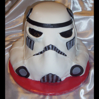 Storm Trooper Had a fun time making this cake. It's a strawberry/tahitian vanilla cake. I used one 6 in, three 8 in, and used carved pieces for the...