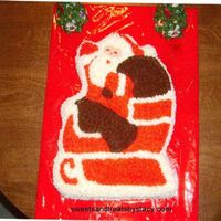 Santa Cake This cake I did last year for my husband to take to work for his Christmas party.