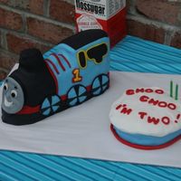 Thomas The Train Cake For my son's 2nd birthday. The wheels needed more black spokes, but I ran out of black fondant and ran out of time to make more. I...