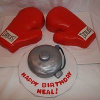 Boxing Gloves And Ringside Bell Gloves and bell covered in MMF.