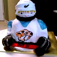 Hockey Player My son really wanted a hockey player for his design this year...so...this is what he got. I used several 8in rounds and carved out the body...