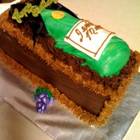 Bottle Of Wine This cake was designed for a friend who loves wine. All cake with fondant and cream cheese icing.