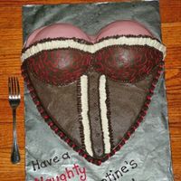 Naughty Valentine's Day Got the idea for this one right here...thank you!Red Velvet Cake. Body was 1 layer. Made heart shape by using 1 9" square cake, turned...