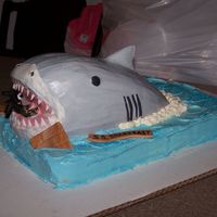 Shark Eating Fisherman This was the REQUEST of the birthday boy - hahaha- a shark eating a fisherman! Complete with broken peices of the boat, it was actually...