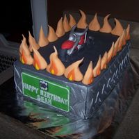 Motorcycle Breaking Out Of Asphault :) One of four cakes we did for a four-prson birthday party. This one was for a 30th b-day :)