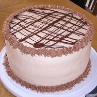 Amaretto Cake This is Macsmom's Amaretto Divine recipe. I covered it in almond BC and drizzled melted choc on top. First time using the Viva paper...