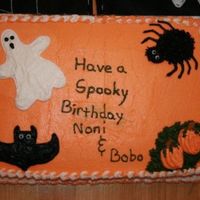 Halloween Birthday Cake All BC. Tried new technique on the border with color striping using the new technique I found on the forums using plastic saran wrap inside...