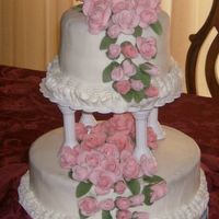 Pink Roses My first try at a tiered cake and fondant roses.