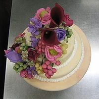 Vineyard Theme Wedding Cake This is a cake I made at school for our "wedding cake project." The theme was vineyard wedding and they liked burgundy and purple...